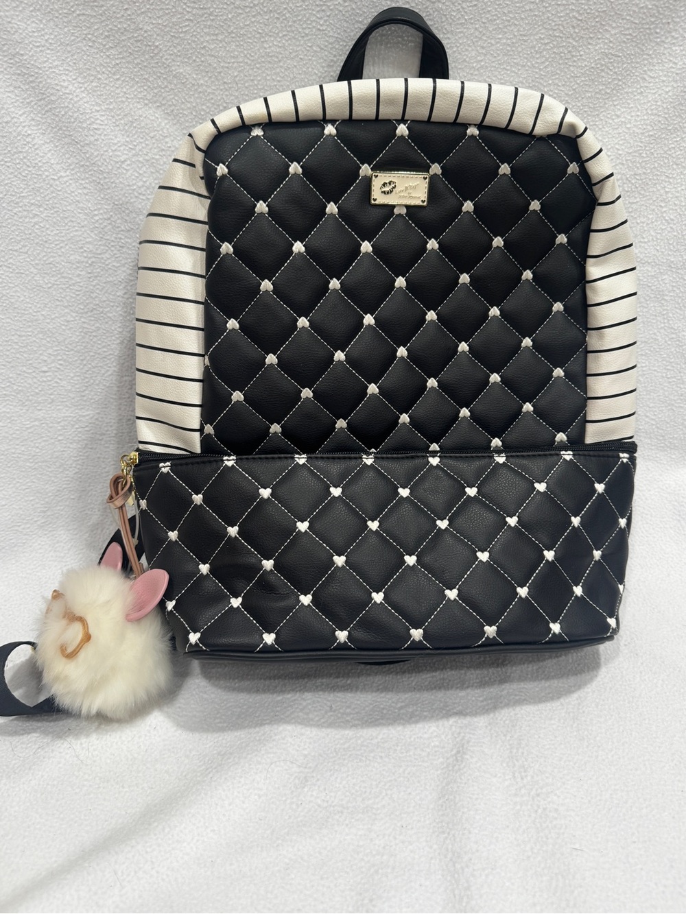 Betsey Johnson Black and White Quilted Backpack with Pom Charm
